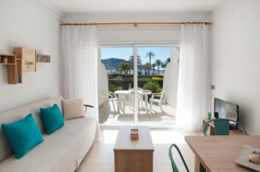 Apartamento a pie de playa, climatizado y parking